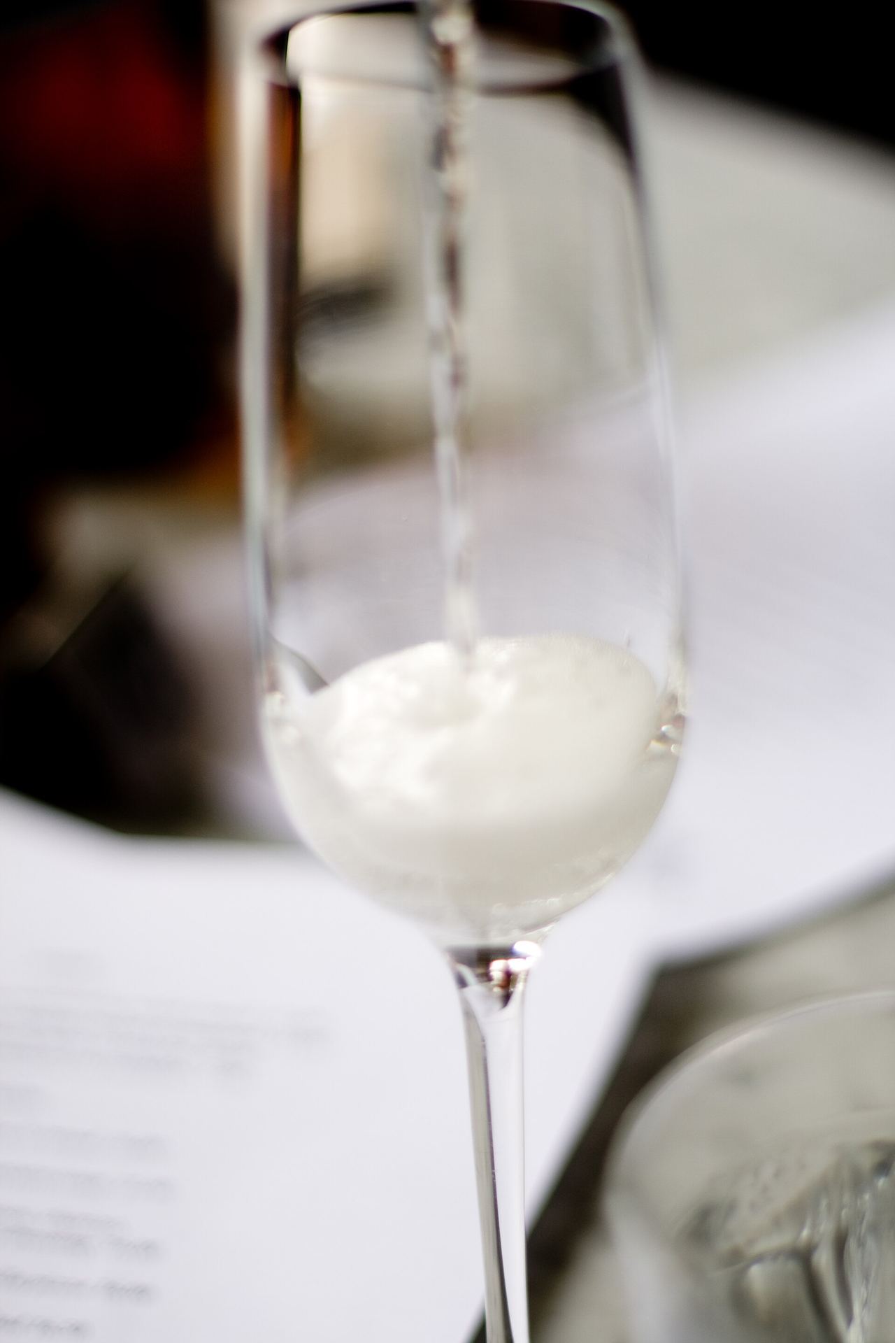 Champagne being poured at the bar