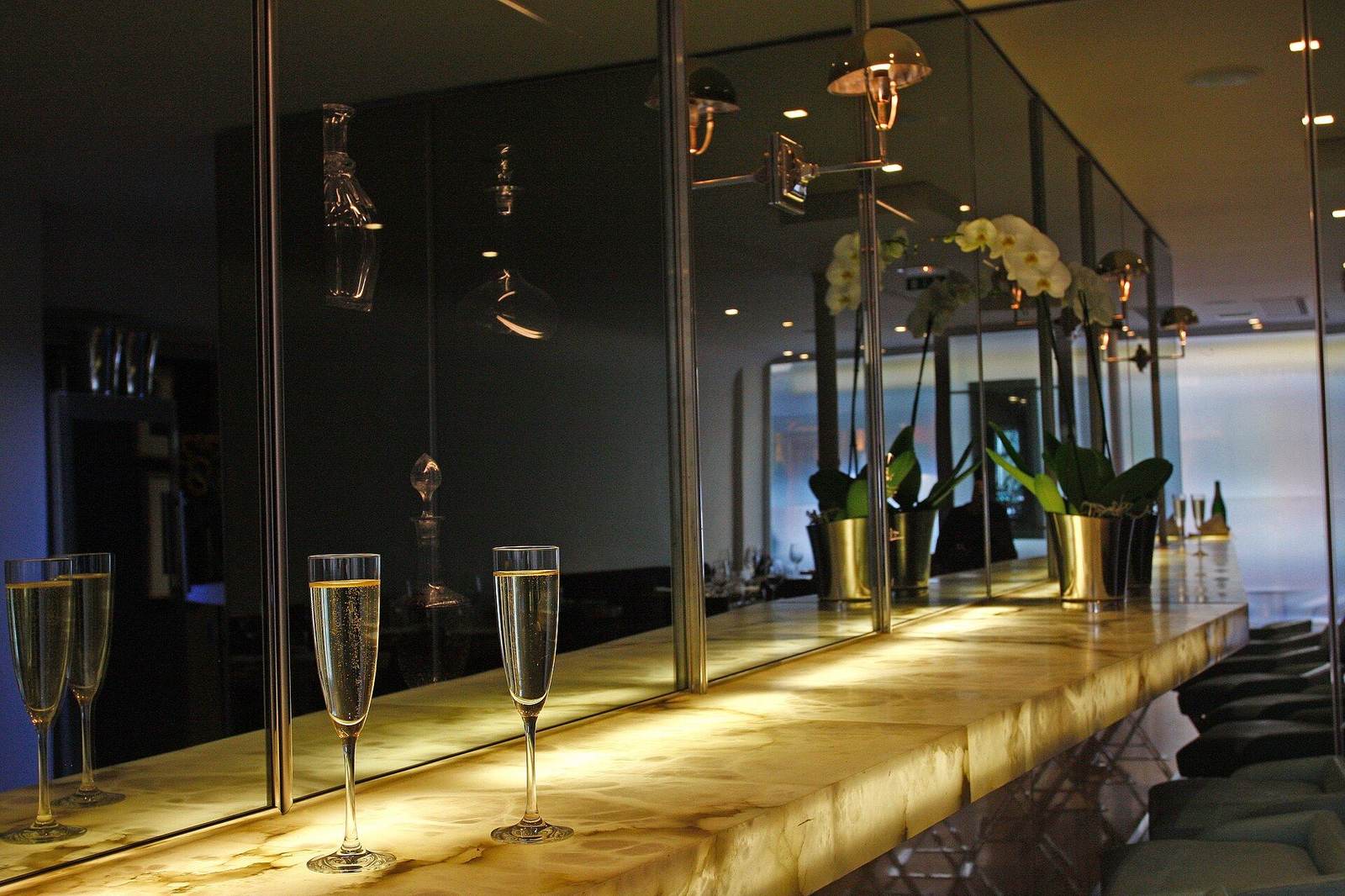 Champagne bar with brass fittings and warm lighting