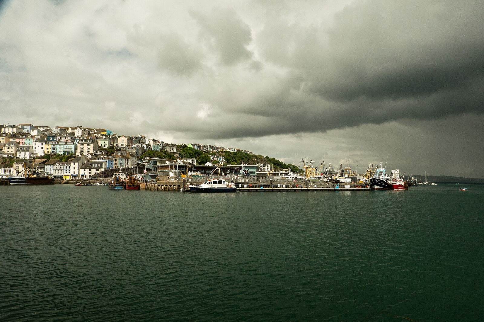 Fishing boats moored at the historic harbourside at dusk